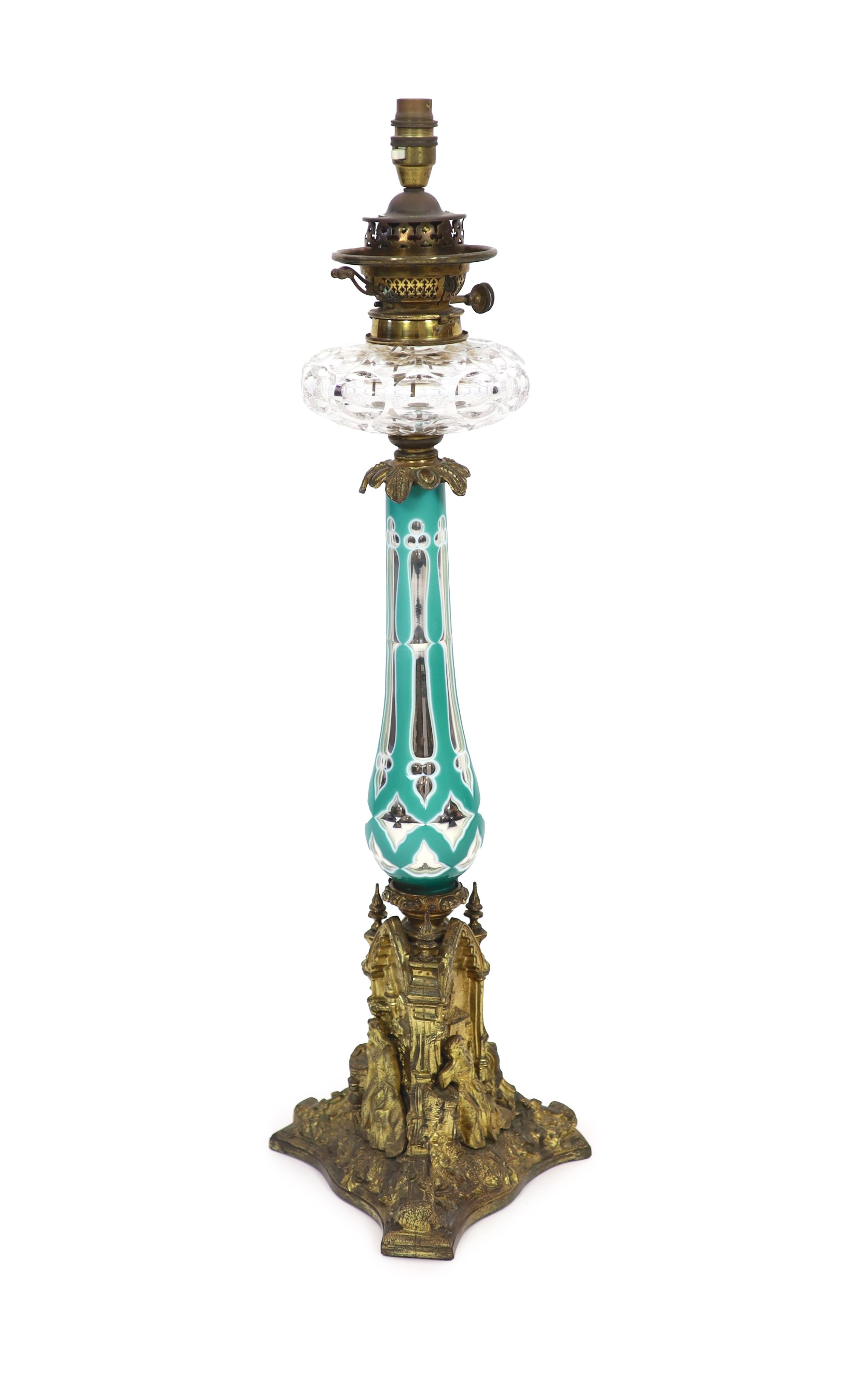 A rare ormolu mounted overlaid ‘mercury’ glass table lamp, the glass possibly by James Powell & Sons, mid 19th century, height 73cm